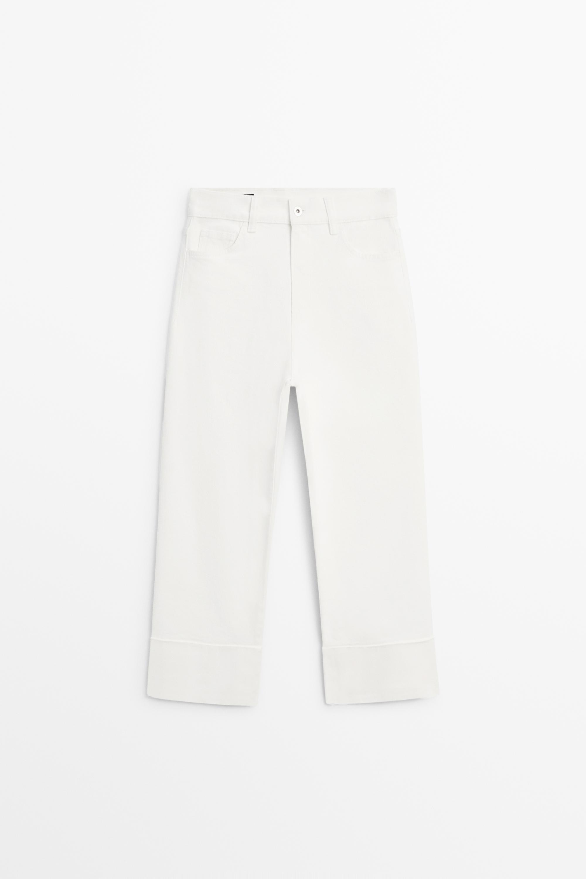 Jean capri taille moyenne retroussé